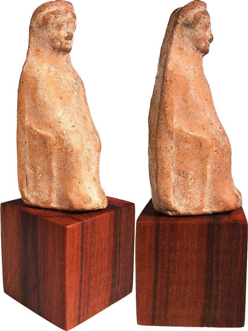 Ancient Greek terracotta figure of an enthroned woman with a 