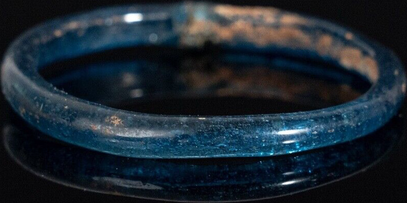 A Roman glass bangle bracelet, deals c.1st-4th Century AD, translucent turquoise blue