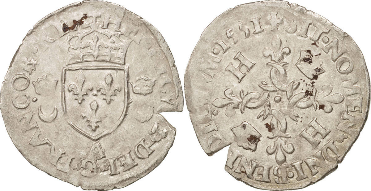 Монеты короля Франции Henri II. Герб Франции на монетах.
