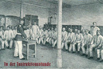 Deutsches Reich Ansichtskarte/In der Instruktionsstunde -
