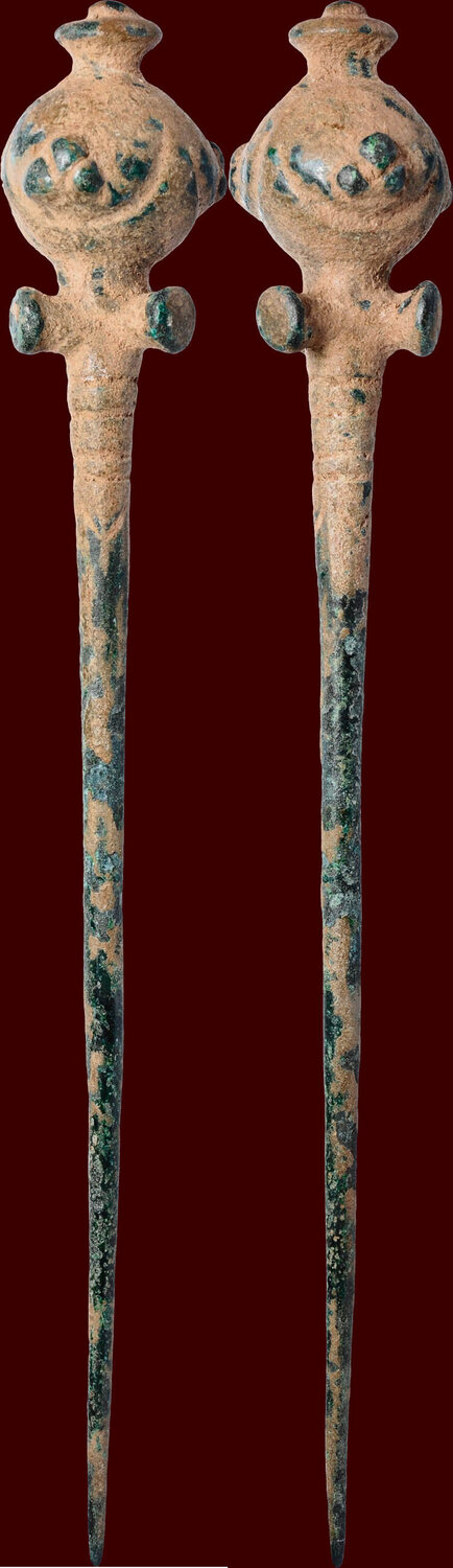 A Large Bronze Age Period Poppy Headed Cloak Pin.