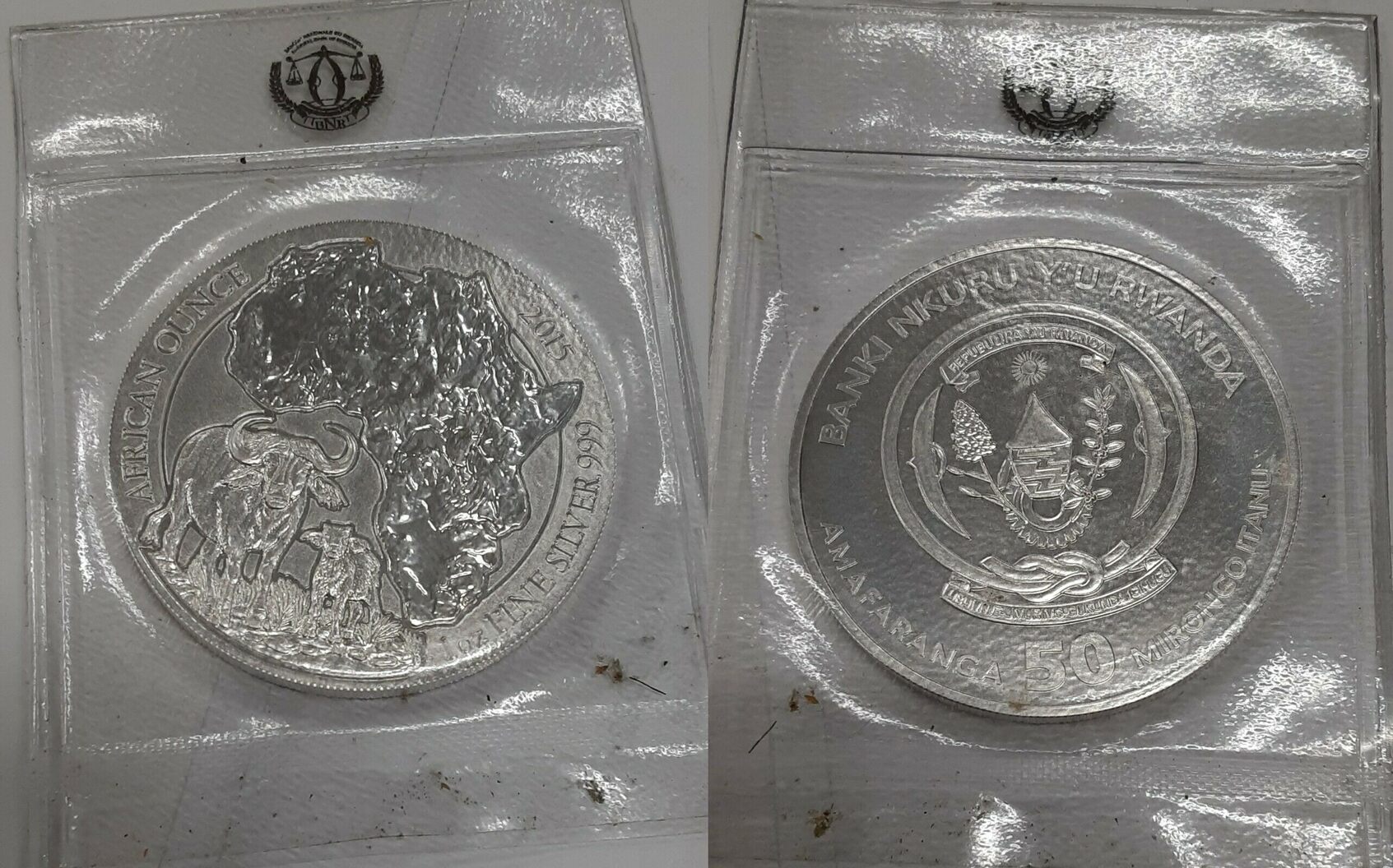 50 Amafaranga 2015 Rwanda 1 Ounce .999 Fine Silver Coin Cape Buffalo  BU/Sealed Gem Uncirculated and sealed in plastic.