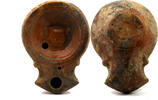 Roman oil lamp Roman volute nozzle oil lamp with skyphos. -