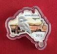 Australien 1 Dollar Silbermünze - 1 oz Silver Coin OVP 2012 Australian Map Shaped Coin - Kookaburra BU colorated (slightly toned) with orig. packaging