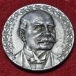 Germany Deutschland Karl Götz Medaille Weißmetall White Metal 1909-DATED Langstreckenflug Friedrichshafen München Ehrenbürger Graf Zeppelin unc min. scr.