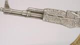 ASSAULT RIFLE Gilded 2 Oz Silver Coin 10000 Francs Chad 2024 Antique Finish