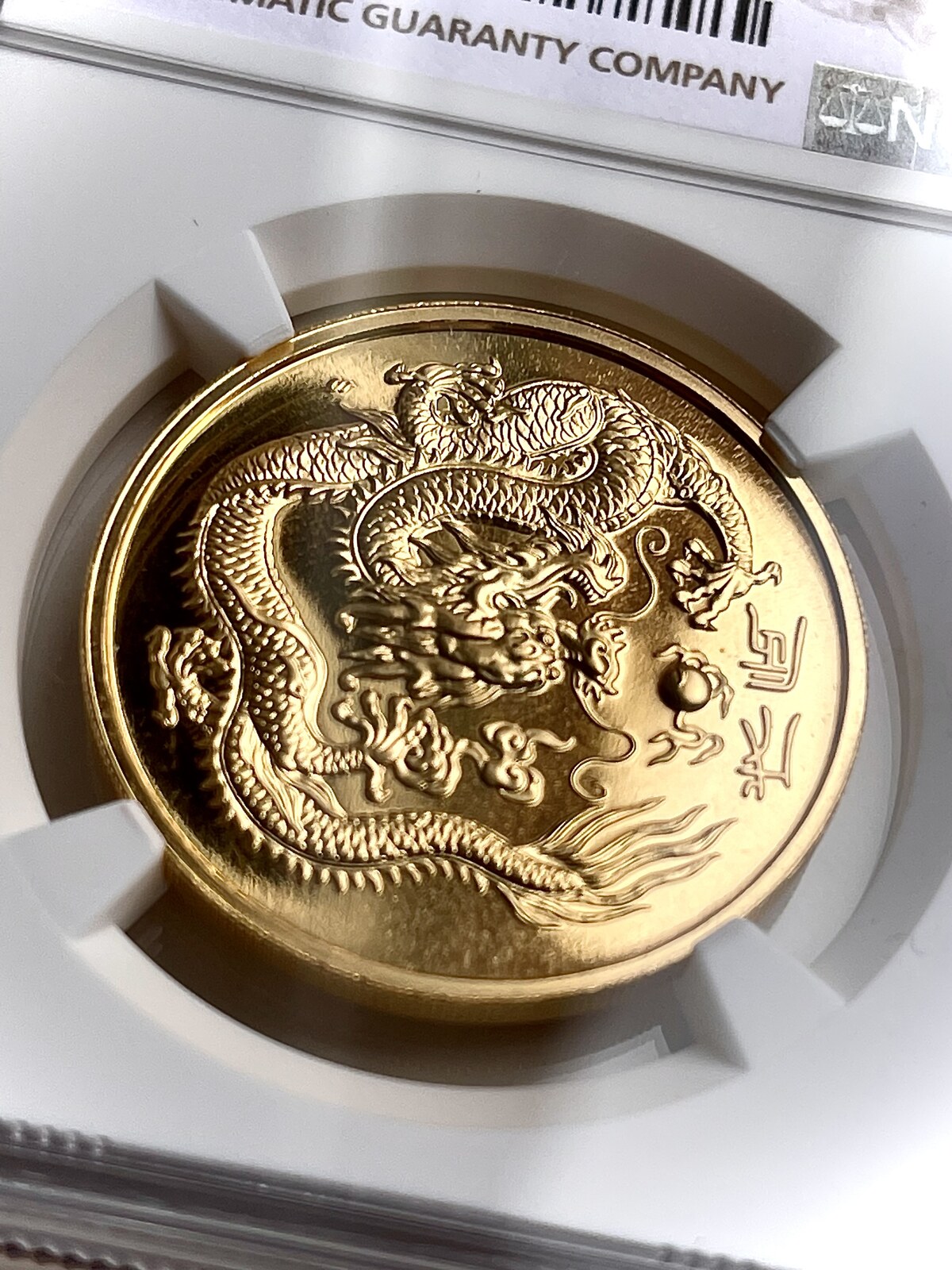 G100S 1988SM Singapore – “Year of the Dragon” 100 Singold