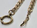 Uhrenkette Kette Double Taschenuhr Antike Golddouble Taschenuhrenkette AxD, A.M. Charnier Gold, L: 27,5 cm mit normalen Gebrauchsspuren.