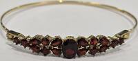 Goldschmuck Gelbgold vintage   333er 8Kt Armreif Granat Granatarmreif Granatschmuck mit normalen Gebrauchsspuren.