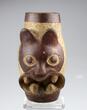 Ancient art  A splendid barrel shaped Moche vessel with Feline heads w large fangs Intact.